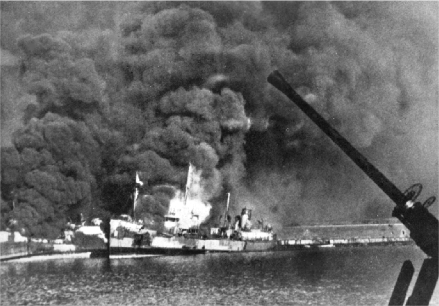 The SS John Harvey on fire after a German attack on 12/2/1943 in the Italian port of Bari